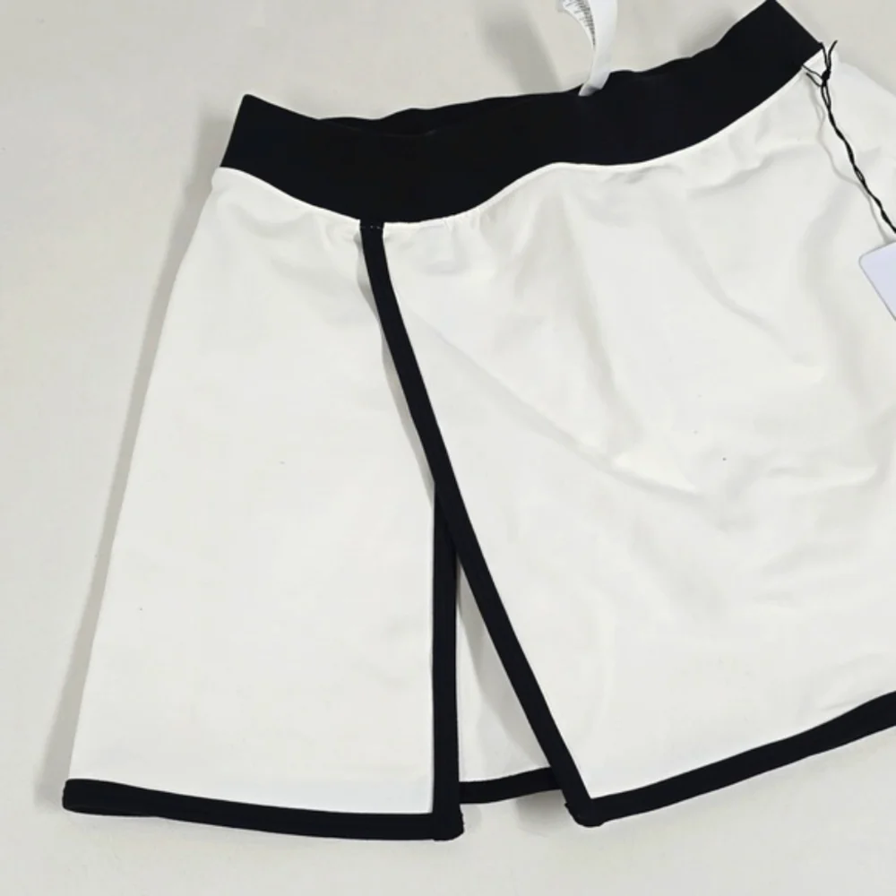 ALO Yoga Cream Mini Skort with Black Trim